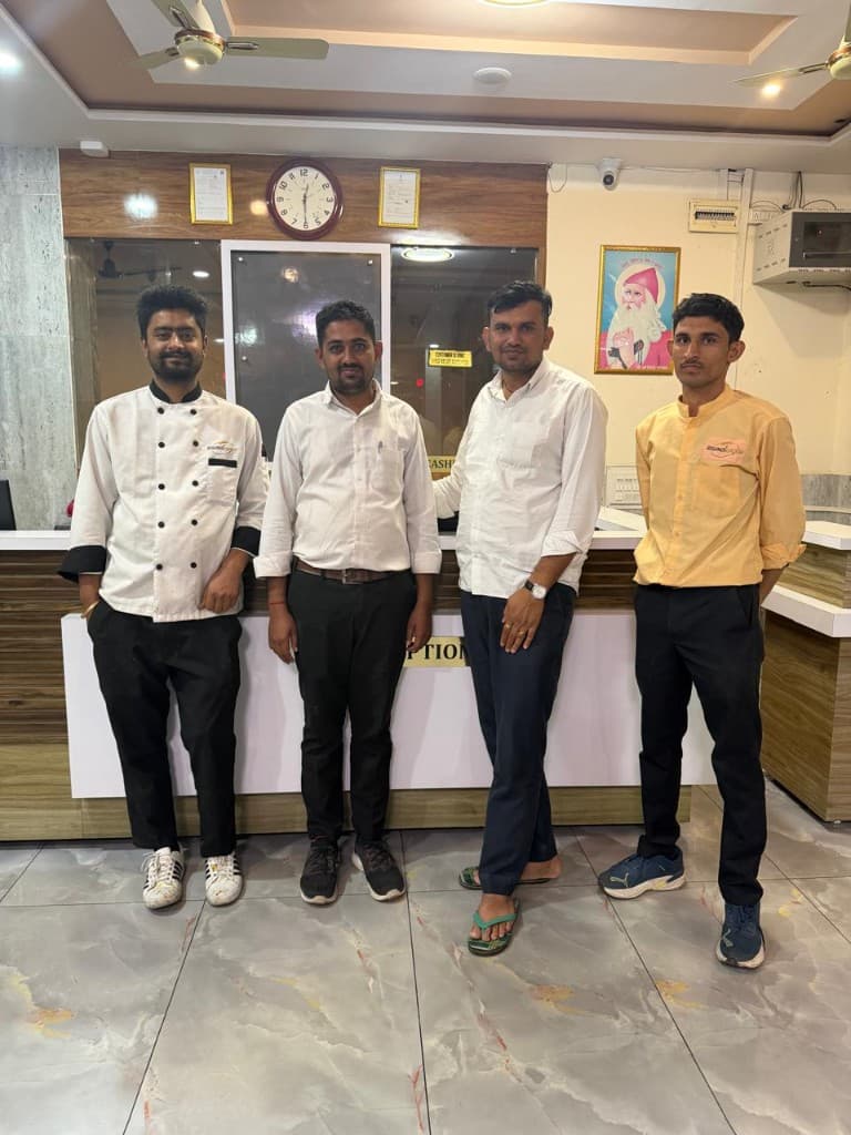 Staff at the hotel reception desk