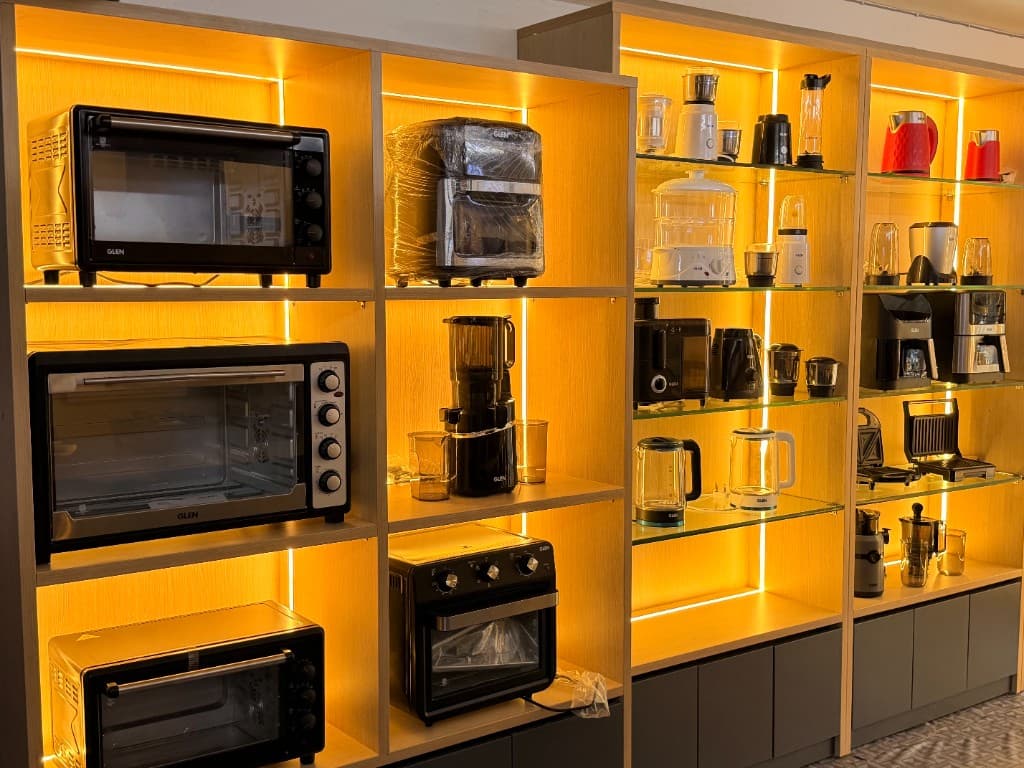 Glen small kitchen appliances on gallery shelves